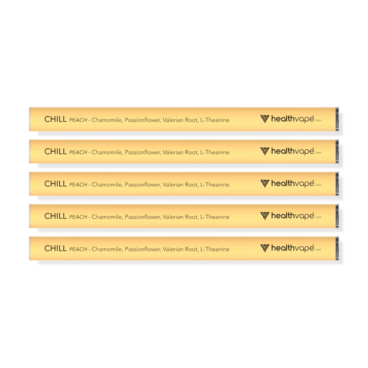 Five yellow HealthVape Chill Chamomile Peach disposable pens lined up horizontally