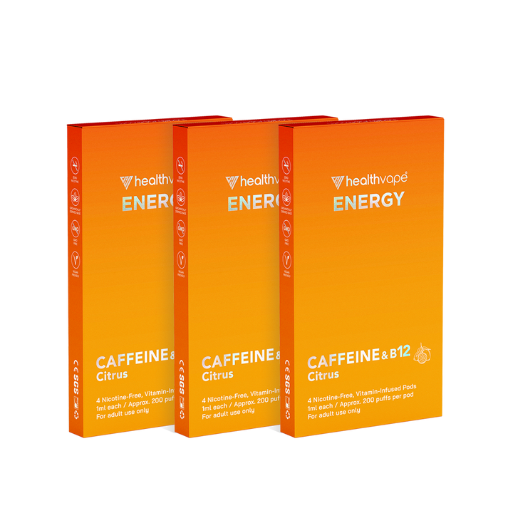 Three upright packs of HealthVape ENERGY Citrus pods with caffeine and B12, orange gradient packaging.