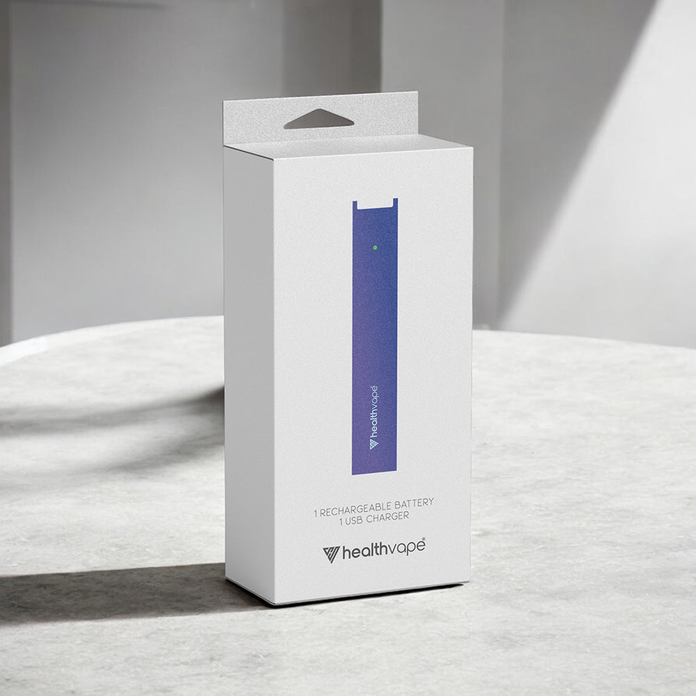 HealthVape rechargeable battery and charger kit box standing on a light stone surface.