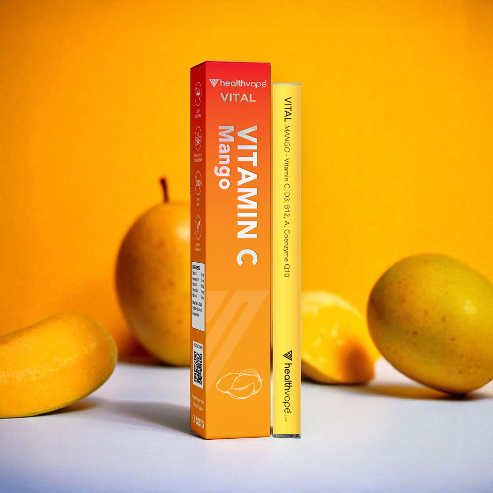 HealthVape VITAL Mango disposable inhaler with orange-yellow packaging, labeled with Vitamin C, D3, B12, A, and Coenzyme Q10.