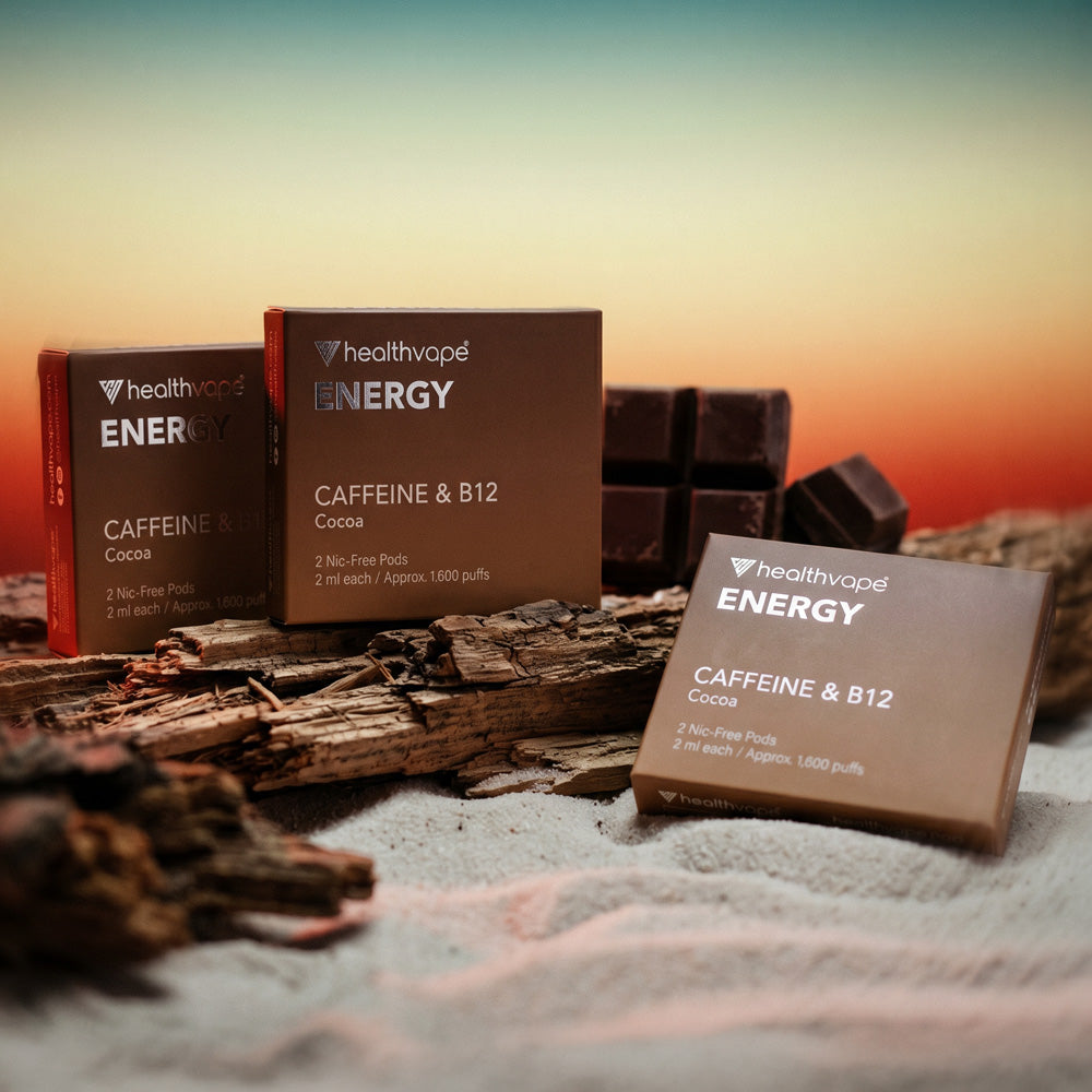 Three HealthVape ENERGY Cocoa pod boxes with chocolate garnish