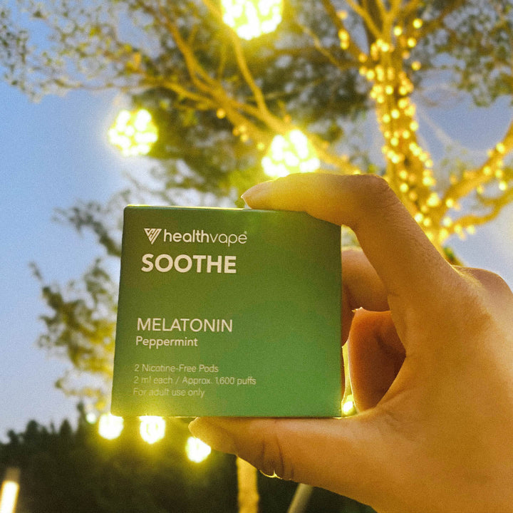 HealthVape SOOTHE Peppermint Melatonin pod box on leaves in natural light