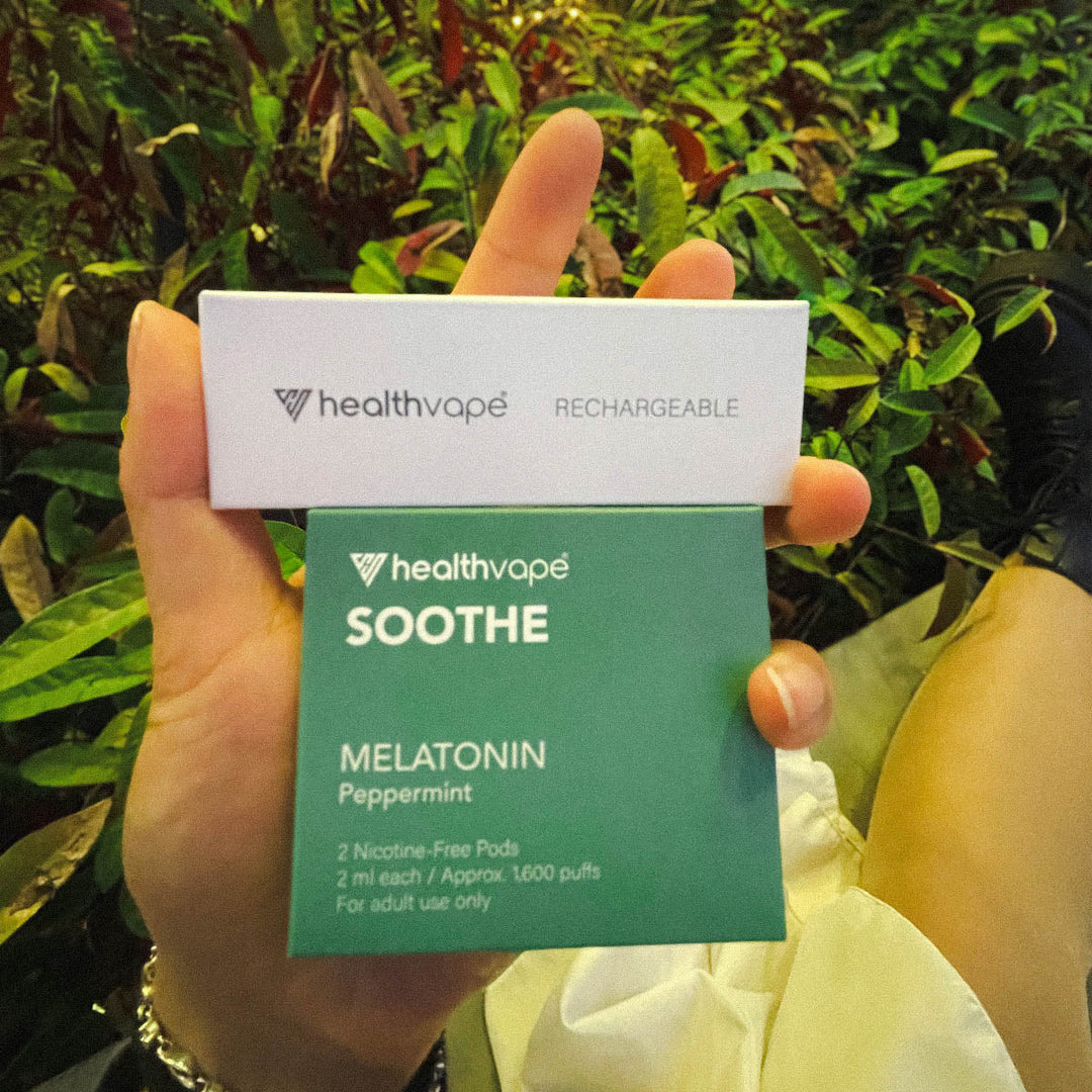 HealthVape SOOTHE Peppermint Melatonin pod box on garden leaves close-up