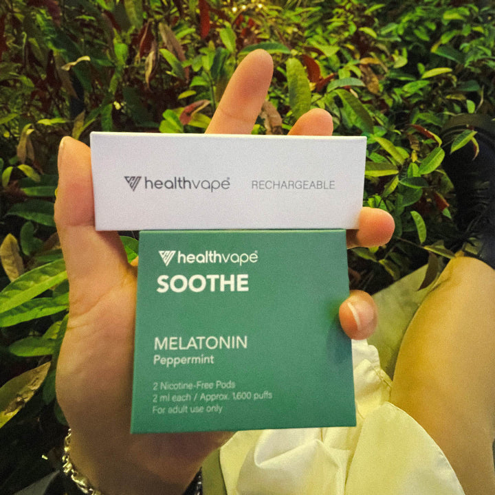 HealthVape SOOTHE Peppermint Melatonin pod box on garden leaves close-up